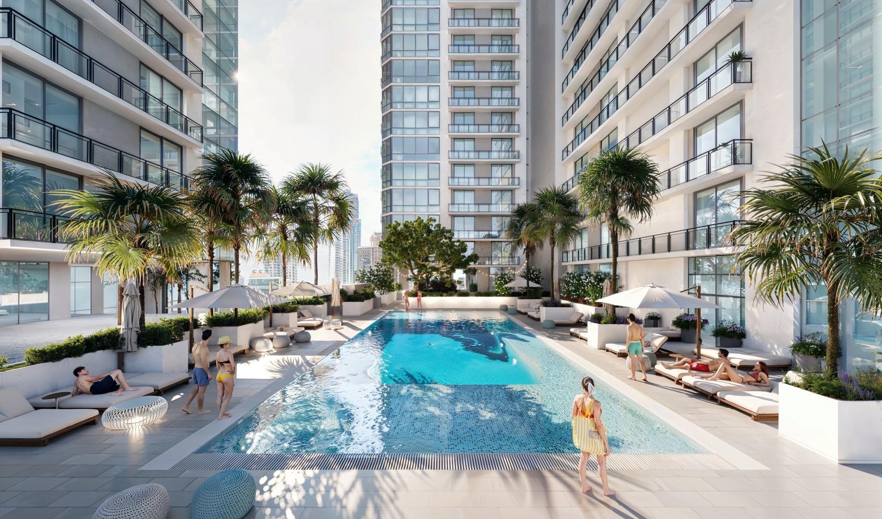 a rooftop pool overlooking a city skyline