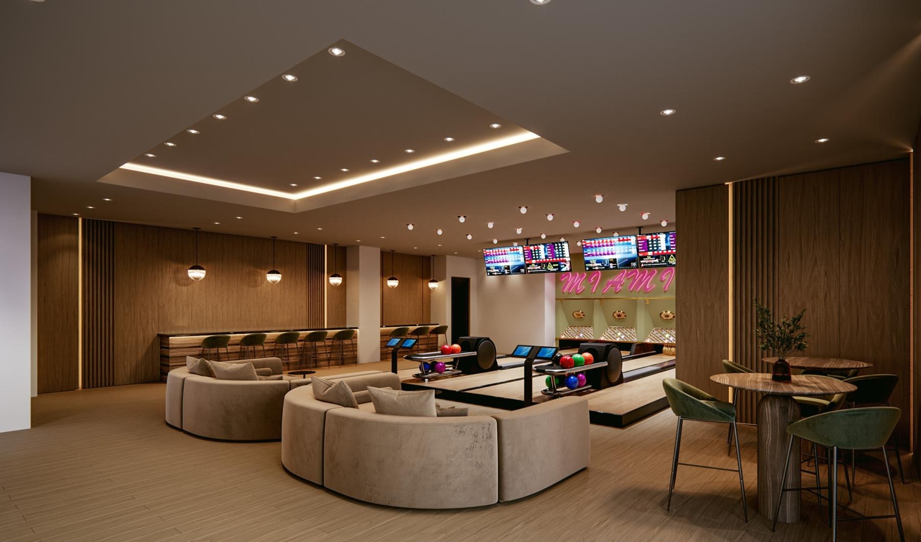State-of-the-art amenities a bowling alley with couches, tables and chairs