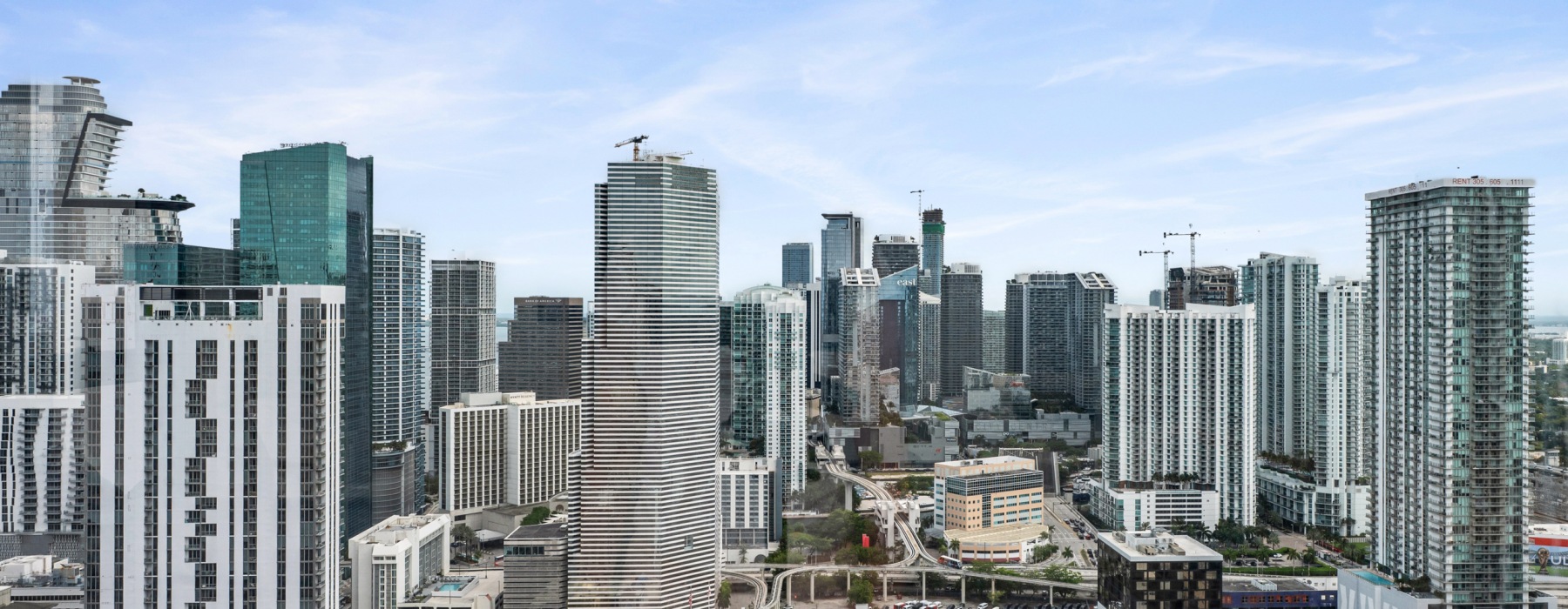 Aerial view of the downtown Miami and Brickell skyline from a CMPND Miami apartment